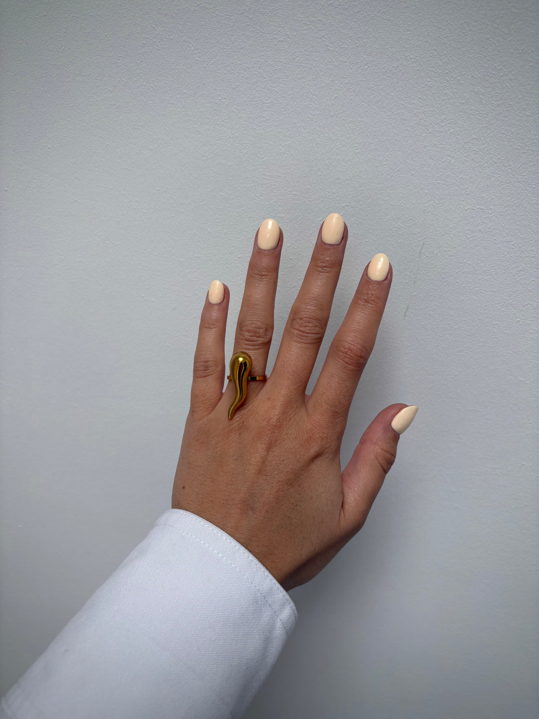 Long drop gold ring