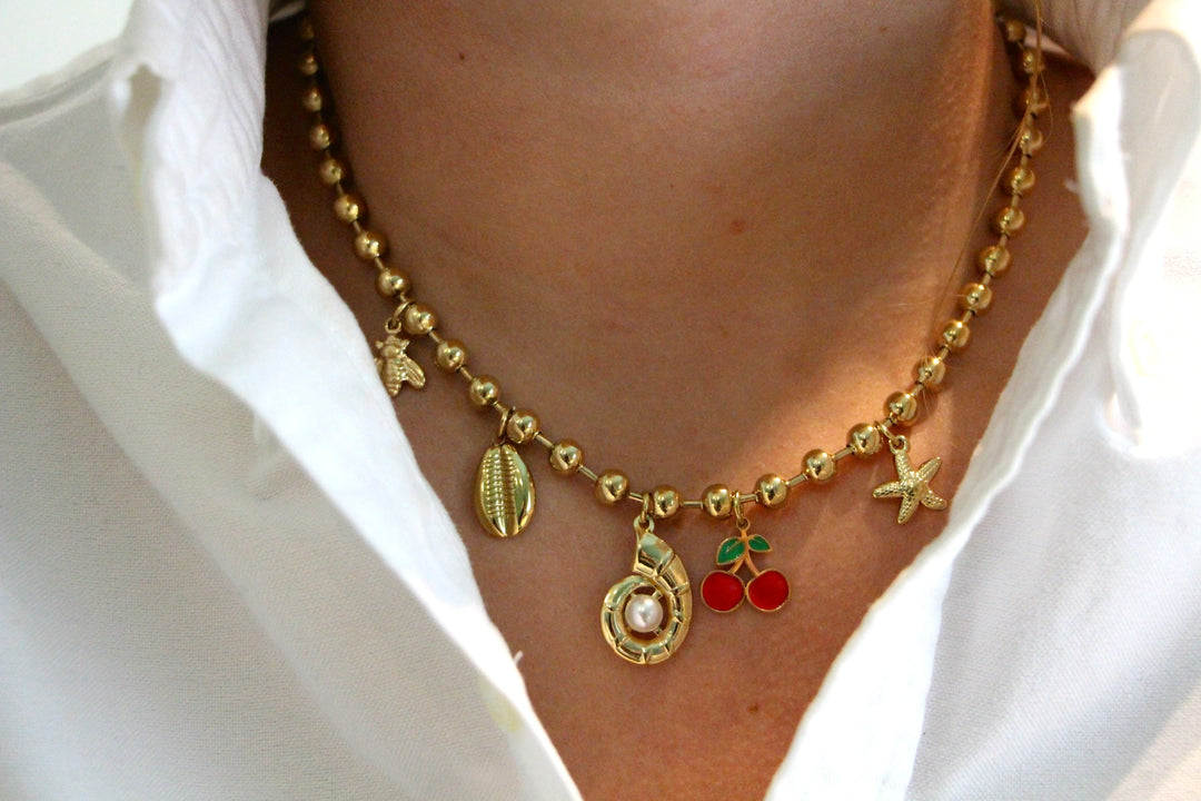 Gold pearl cherry shell necklace